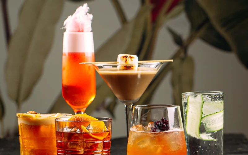 side-view-variety-different-sweet-mixed-alcoholic-cocktails-scaled.webp
